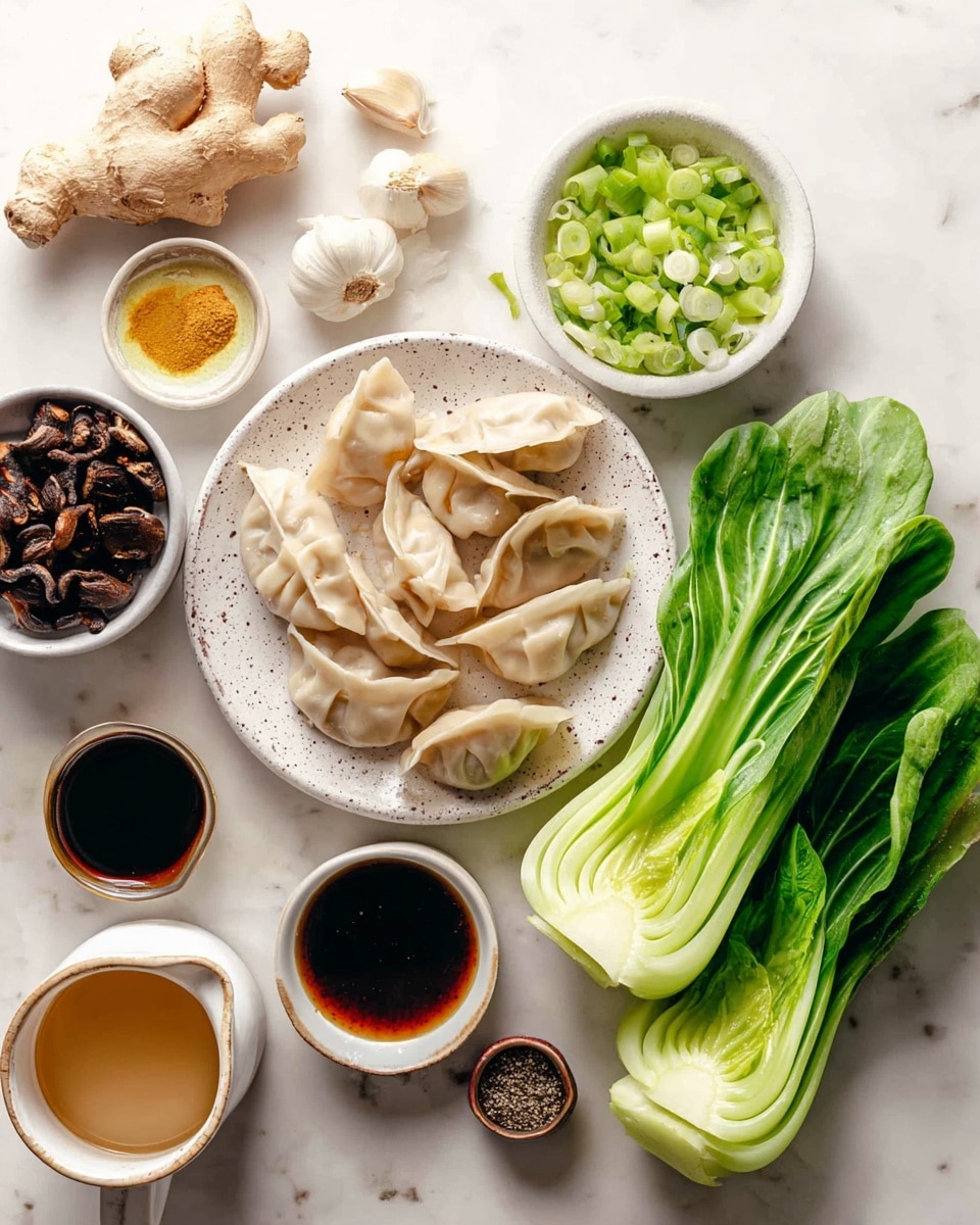 A group of ingredients is arranged on a white marbled surface, featuring a pile of uncooked dumplings with light beige skins and delicate folds stacked on a white speckled plate near the center. To the right, fresh green bok choy leaves with water drops are placed vertically. Above the dumplings, there is a small white bowl filled with chopped green onions, showing vibrant green and white slices. To the left, a round white plate holds a piece of ginger root in the middle, four garlic cloves near the ginger, and three small bowls containing black pepper, olive oil with pepper, and dark soy sauce. A larger white bowl filled with dark brown dried shiitake mushrooms is at the bottom left, and a white cup with a light brown sauce is also visible nearby. photo taken with an iphone --ar 4:5 --v 7