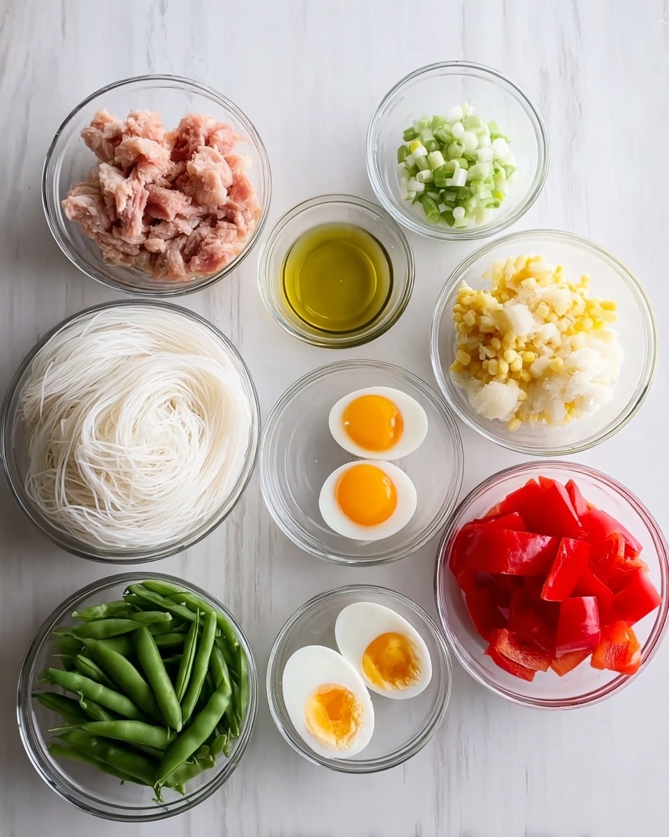 The image shows eight clear glass bowls arranged on a white marbled surface. The top left bowl contains small pieces of raw pink chicken, below it is a large bowl with long white rice noodles, and to the right are two eggs cracked open in a bowl with bright yellow yolks. Next to the eggs is a small bowl with oil, and to the right of that is a small bowl with minced garlic. Above the garlic bowl is another with light yellow baby corn pieces, and above it is a bowl holding chopped white onions. Below the onion bowl, there is a bowl with bright green snap peas. Lastly, at the bottom right is a bowl with large chunks of red bell pepper. All bowls are white in color, viewed from above, and the scene is well lit. Photo taken with an iphone --ar 4:5 --v 7