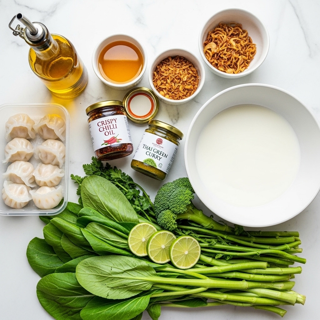 The image shows a collection of fresh cooking ingredients arranged on a white marbled surface. In the bottom right corner, there is a bunch of vibrant green leafy vegetables with stalks and stems, including baby bok choy, broccoli, and some lime cut into three wedges placed on top, creating a mix of bright green shades and smooth textures. Above this leafy arrangement is a large white bowl filled with a white liquid. To the left of the bowl, there are two small glass jars lying on their sides, one labeled