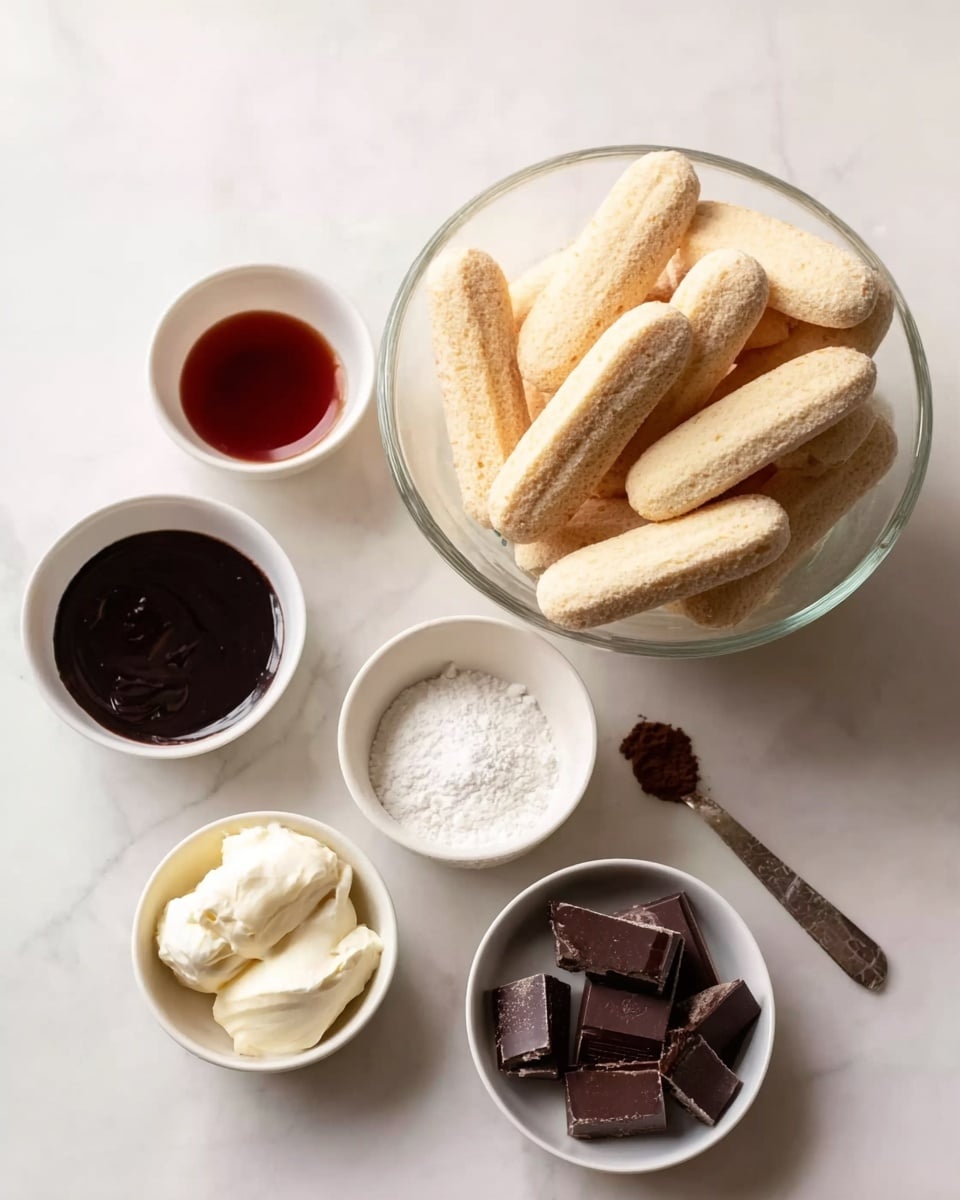 The image shows a clear glass bowl filled with light beige ladyfinger biscuits stacked inside. Around the bowl, there are four small white bowls placed on a white marbled surface; one bowl contains a dark reddish-brown liquid, another has fine white powder, the third has soft white cream, and the last holds broken dark chocolate pieces. A small dish with dark brown powder, likely cocoa, is also visible near the bowls. All items are arranged neatly with soft natural light highlighting their textures. photo taken with an iphone --ar 4:5 --v 7