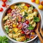 Tortellini Pasta Salad with Cherry Tomatoes, Artichokes, and Fresh Herbs Recipe