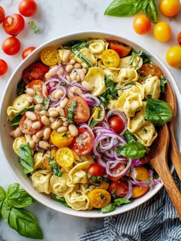 Tortellini Pasta Salad with Cherry Tomatoes, Artichokes, and Fresh Herbs Recipe