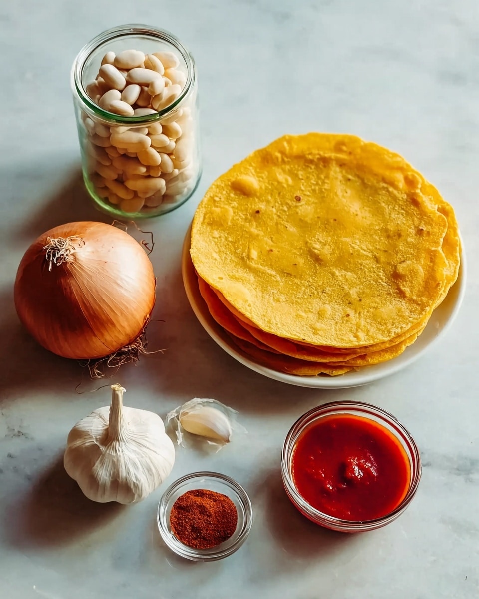 The image shows a flat stack of six yellow corn tortillas placed on a white plate on a white marbled surface. To the right of the tortillas is a small clear bowl filled with red sauce. Above the plate is a glass jar filled with white beans. To the left of the jar is a whole brown onion with dry peel on the white marbled surface. Below the onion is a white garlic bulb with some skin still attached. Below the garlic bulb is a small clear bowl containing powdered spices in different colors: white, red, and brown. The light source highlights the soft texture of the tortillas and the smooth surface of the beans and the onion. The photo was taken with an iphone --ar 4:5 --v 7