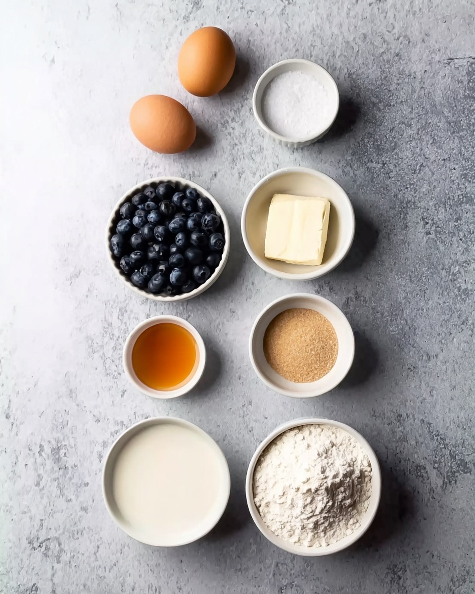 The image shows eight small bowls and two eggs placed on a white marbled surface. The top left of the image has two brown eggs next to a small white bowl with white granules. Below it is a small white bowl with amber liquid. At the bottom left corner, there is a small white bowl filled with dark blue blueberries. On the right side, near the top, is a small white bowl filled with melted white butter. Below it is a medium-sized white bowl filled with white milk. Below the milk bowl is a small white bowl filled with light tan brown sugar. At the bottom right corner, there is a large white bowl filled with white flour. All these items are arranged neatly from top to bottom and left to right. photo taken with an iphone --ar 4:5 --v 7