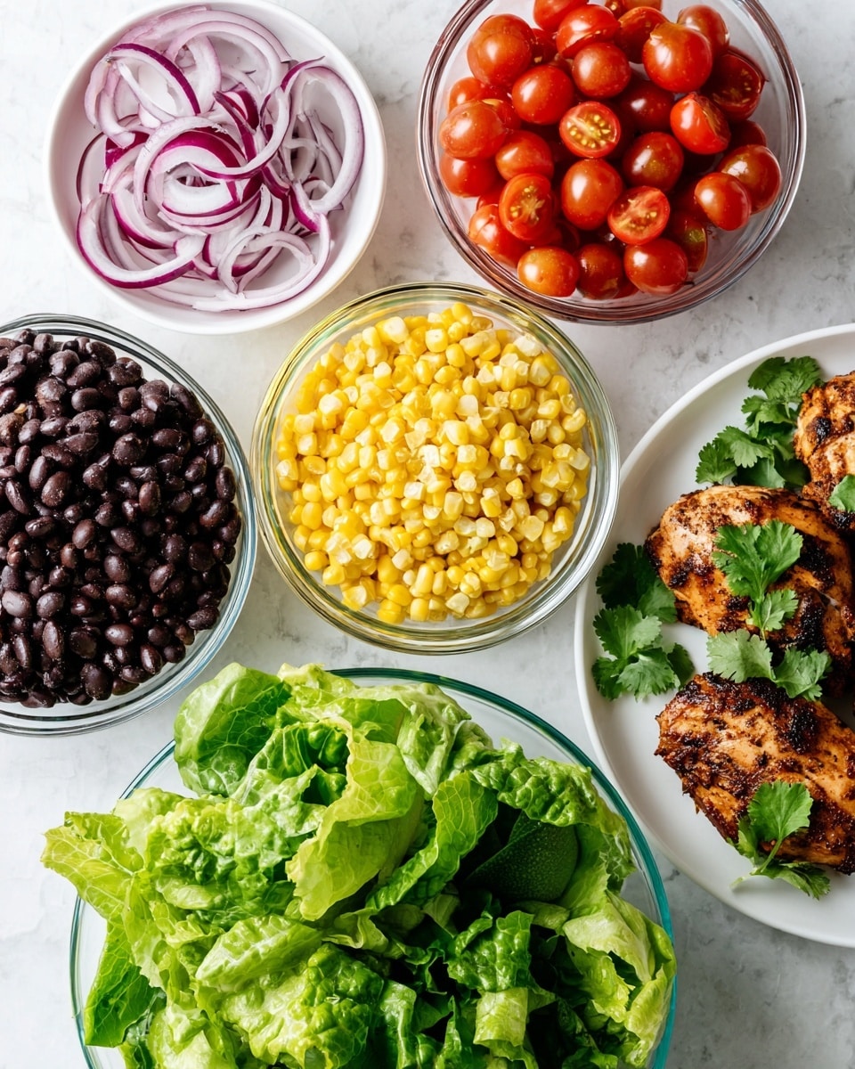 The image shows six bowls and plates of food on a white marbled surface. At the bottom center is a glass bowl filled with fresh green lettuce leaves with a crisp texture. To the left of this bowl is a small white plate holding thin slices of red onion with purple and white rings. Above the lettuce is a clear glass bowl filled with bright red cherry tomatoes, some cut in half showing their juicy inside. To the upper left is a white bowl filled with black beans, shiny and smooth. To the upper right is a white bowl filled with yellow corn kernels, plump and glossy. On the right side, a white plate holds two browned grilled chicken pieces garnished with fresh green cilantro leaves. The photo taken with an iphone --ar 4:5 --v 7