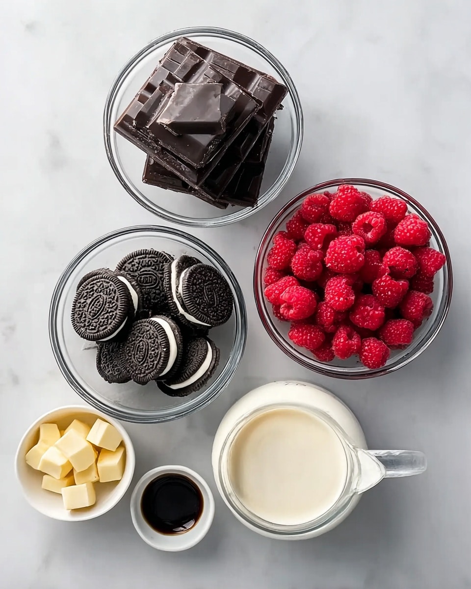 A top view of five clear bowls and a small white pitcher arranged on a white marbled surface. The largest bowl in the center holds stacked dark chocolate bars, rich and shiny. To the right, a medium bowl is filled with fresh red raspberries, soft and inviting. Below, another medium bowl contains whole black sandwich cookies with white cream inside, neatly stacked. To the left, a small bowl is filled with solid, pale yellow butter cubes. Above it, a tiny bowl holds dark brown vanilla extract. In the bottom right corner, a white pitcher reveals smooth white cream ready to pour. Photo taken with an iphone --ar 4:5 --v 7