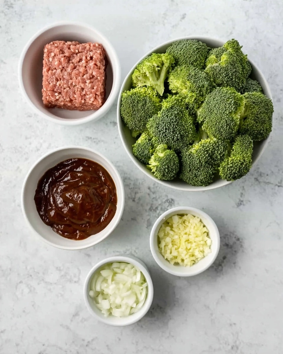 The image shows five white bowls placed on a white marbled surface. The largest bowl is filled with fresh green broccoli florets, showing their detailed, bumpy texture. Below and to the left, a medium white bowl contains a square of raw ground meat, pinkish with fat flecks. Next to it on the right is another medium white bowl with a thick, dark brown sauce that looks smooth and glossy. Below these, a small white bowl holds finely chopped white onions with a slightly translucent appearance. Finally, the smallest white bowl contains minced pale yellow garlic. The bowls are arranged in a loose circular pattern, all on the white marbled background. photo taken with an iphone --ar 4:5 --v 7