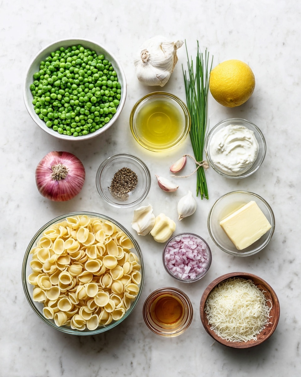 The image shows an overhead view of many ingredients arranged neatly on a white marbled surface. At the center bottom, there is a clear glass bowl filled with pale yellow orecchiette pasta. Above it to the left, a large white bowl holds bright green frozen peas. To the right of the peas is a small glass bowl with golden olive oil. Below the oil, a small glass bowl contains smooth white cream. Above the cream, thin green chives are placed in a bunch vertically. To the right of the pasta is a small glass bowl with a light yellow square of butter. Below the butter, a small wooden bowl is filled with grated white cheese. At the top right center, a small glass bowl holds finely chopped white and light purple shallots. Near the middle left, a yellow lemon rests next to three small red garlic cloves. Below the lemon, a glass measuring cup contains light brown broth. To the left bottom corner, a small wooden bowl holds black pepper, and above it near the lemon, another small wooden bowl contains coarse salt. The colors are fresh and soft, with lots of green, yellow, and white tones. The photo taken with an iphone --ar 4:5 --v 7