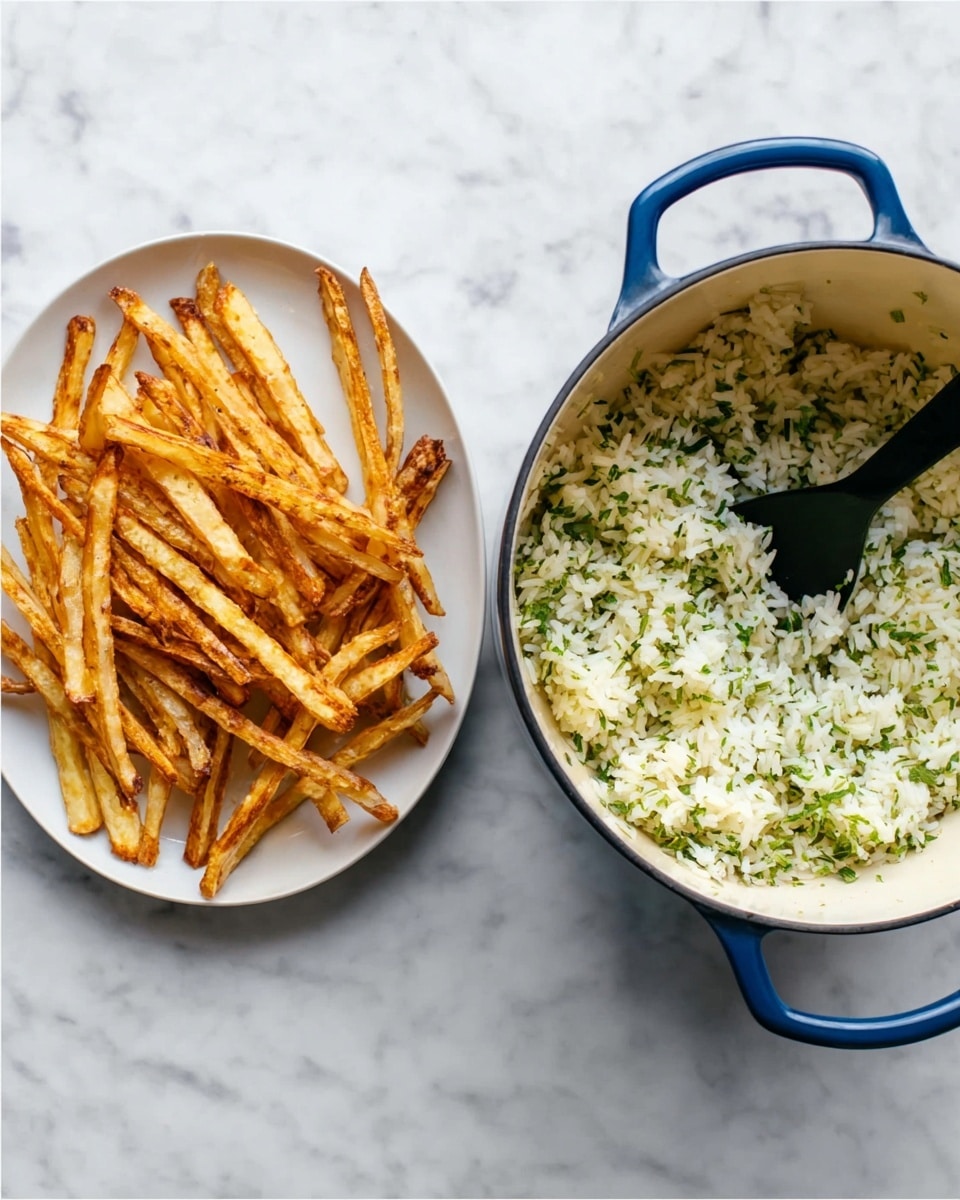 The image shows two dishes on a white marbled surface. On the left, a white plate holds several thin, long, golden brown strips that look crispy and evenly cooked, arranged loosely in a somewhat messy fashion. On the right, a white pot with blue handles contains fluffy white rice mixed with finely chopped green herbs, which adds a speckled green color throughout the rice. A black spoon is partially buried in the rice inside the pot. Photo taken with an iphone --ar 4:5 --v 7