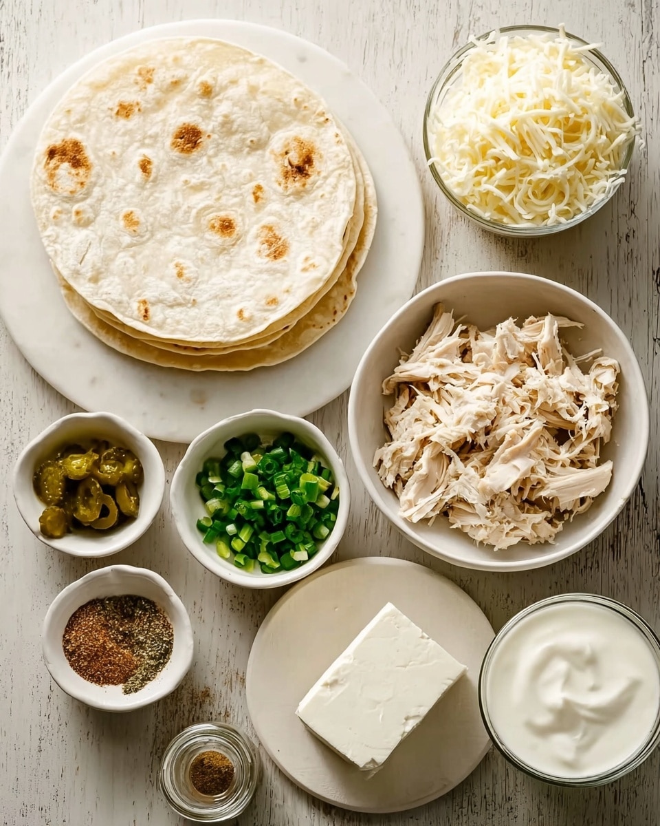 A collection of ingredients arranged on a white marbled surface: a stack of white flour tortillas placed on a white plate with a soft texture and faint brown spots, a bowl filled with shredded white cheese showing fine, thin strands, a small round bowl holding finely chopped green onions, another bowl containing shredded cooked chicken with a light beige color and fibrous texture, a white plate with a block of white cream cheese, two small white bowls filled with black pepper and brown seasoning powder, a small jar of finely chopped green pickles, a glass of milk, and a small bowl with white sour cream featuring a smooth creamy surface. All items are neatly placed with clear detail and natural colors. Photo taken with an iphone --ar 4:5 --v 7