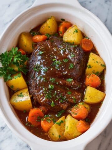 Slow Cooker Pot Roast with Carrots, Potatoes, and Herb Gravy Recipe