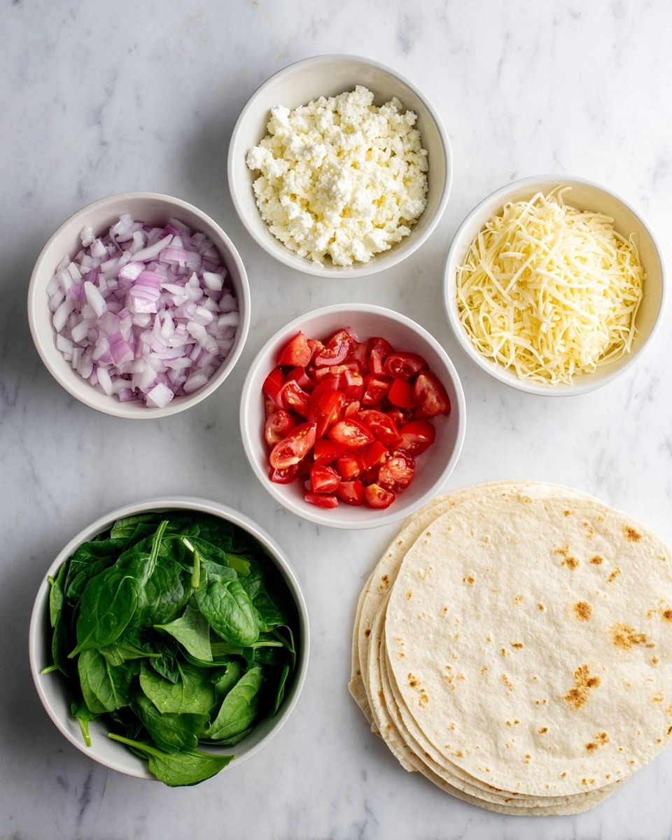 The image shows five small white bowls and a stack of four tortillas on a white marbled surface. The top left bowl contains chopped light purple and white onions with a slightly rough texture. The top right bowl has crumbly white cheese with soft, uneven chunks. The middle left bowl holds bright red chopped tomatoes with a juicy, glossy texture. The middle right bowl is filled with finely shredded pale yellow cheese. At the bottom is a bowl filled with fresh, dark green spinach leaves that are smooth and slightly curled. The stack of tortillas is plain, light beige with some small brown spots. Photo taken with an iphone --ar 4:5 --v 7