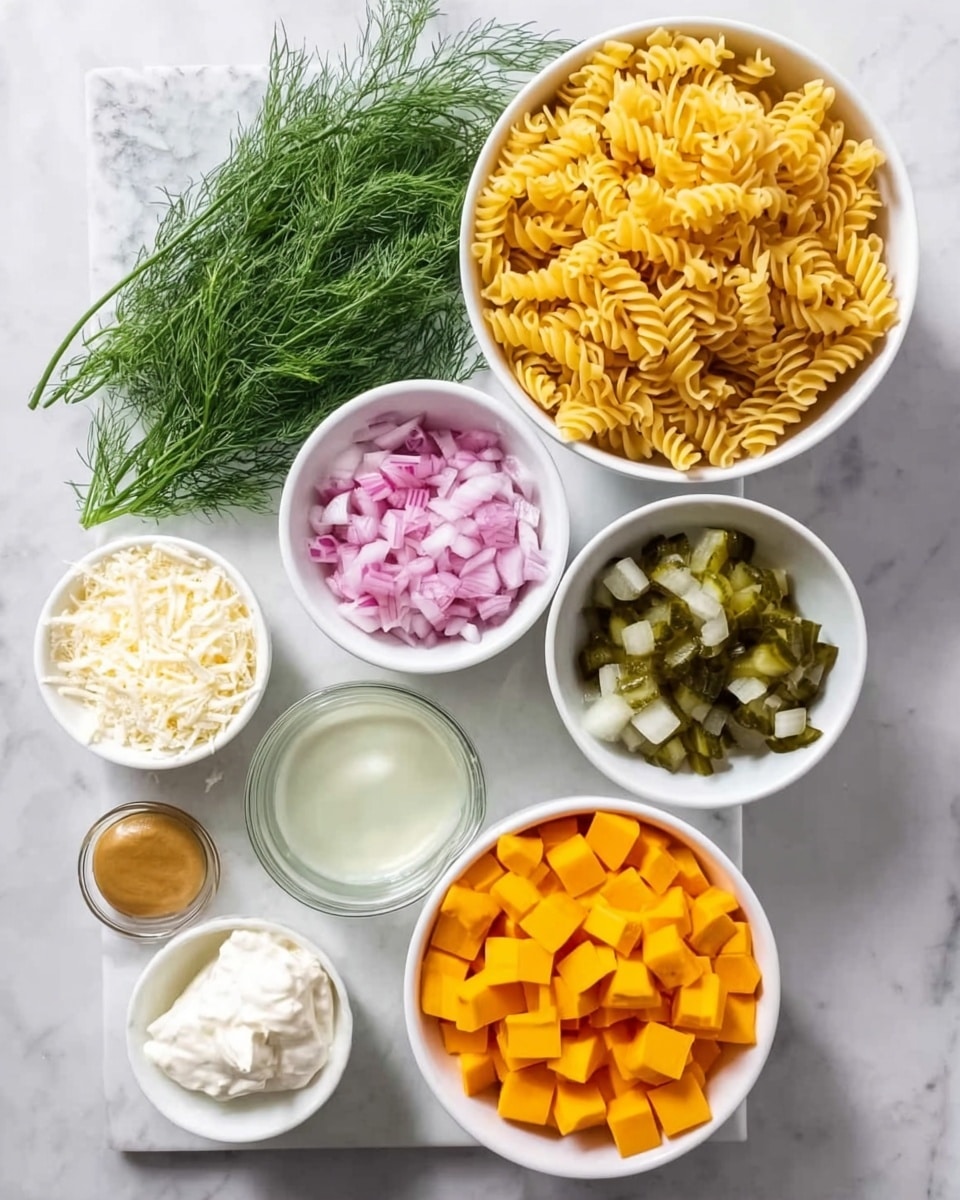 The image shows seven white bowls arranged on a white marbled surface. The top right bowl is full of uncooked yellow rotini pasta with a wavy texture. Below it to the left is a bowl with pink chopped red onions. Next to the onions is fresh green dill with long feathery leaves lying on the surface. On the top left, there is a bowl with grated white cheese. Below it to the left is a bowl with light brown mustard and a dollop of white creamy mayonnaise side by side. Below this is a bowl with a clear liquid, likely vinegar or oil. To the right of this bowl is one containing chopped small cubes of pickles. At the bottom center is a bowl filled with evenly cut small orange cheddar cheese cubes. The scene clearly shows layers of ingredients arranged with neat textures and contrasting colors. Photo taken with an iphone --ar 4:5 --v 7