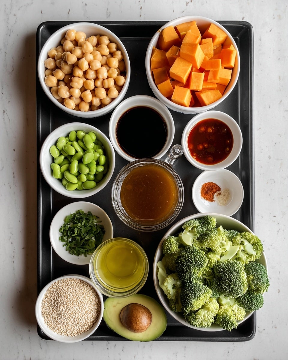A black tray holds several white bowls with fresh ingredients arranged neatly. On the top left, a bowl filled with light beige chickpeas next to a bowl of bright orange cubed sweet potatoes on the top right. Below them, small white bowls contain dark brown soy sauce, a reddish sauce, and finely chopped garlic. To the bottom left, there is a bowl with green edamame beans and another bowl with chopped green herbs. In the center is a glass cup with a thick brown sauce and next to it a small bowl with light yellow oil. On the bottom right, a large bowl is filled with green broccoli florets and next to it is half of an avocado with a smooth green inside. A white bowl filled with small white grains is also present. The tray is placed on a white marbled surface. Photo taken with an iphone --ar 4:5 --v 7