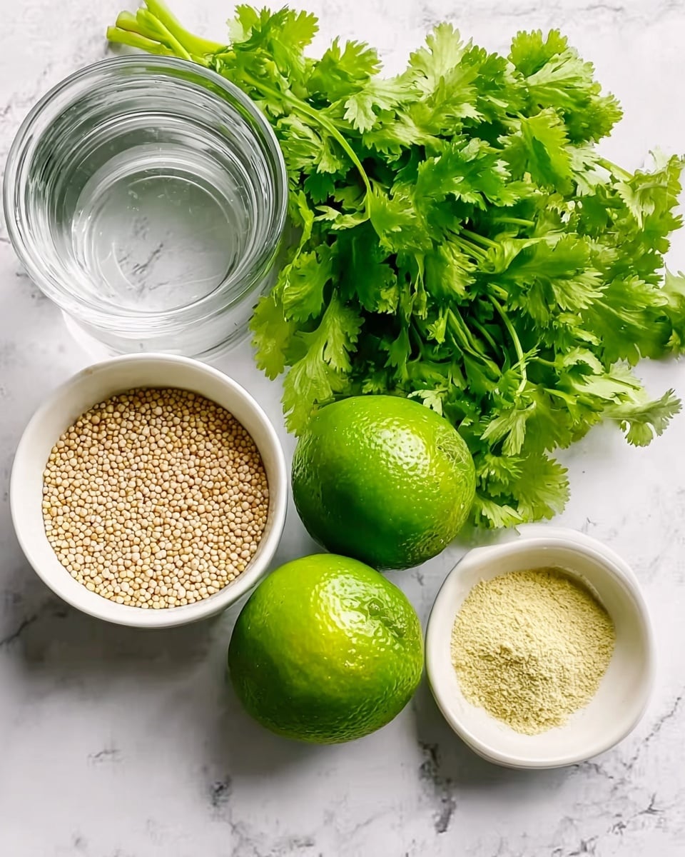The image shows fresh green cilantro with leafy texture on a white marbled surface, two whole green limes with smooth skin placed side by side, a small white bowl filled with light beige quinoa seeds showing a grainy texture, a clear glass cup with water that reflects light, and a small white bowl containing a pale yellow powder. All items are arranged neatly and clearly visible. Photo taken with an iphone --ar 4:5 --v 7