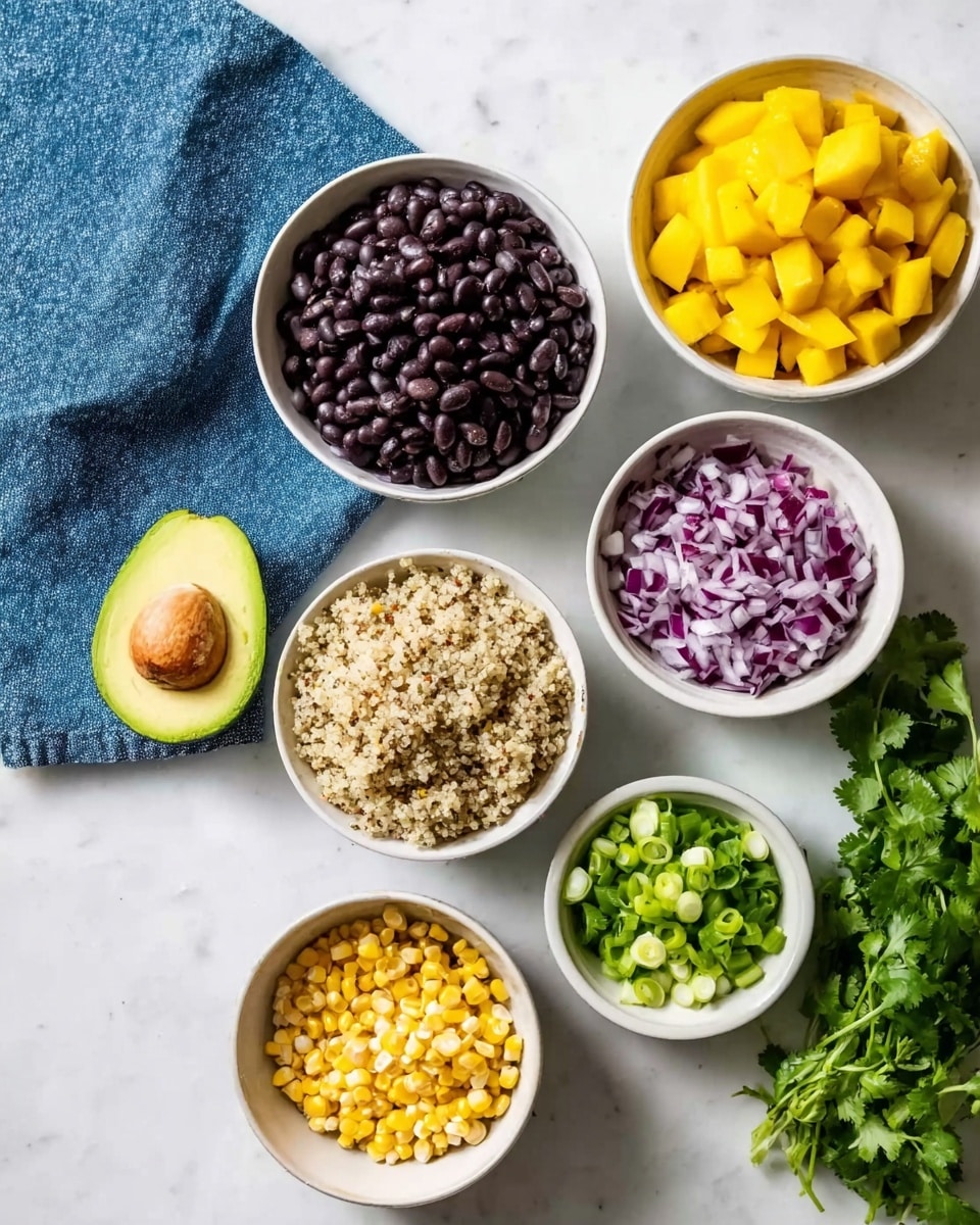 The image shows a collection of ingredients placed on a white marbled surface. There are seven white bowls: one with dark black beans filled to the top at the bottom left, another with fluffy cooked quinoa with light beige and brown colors in the bottom center, a bowl with bright yellow chopped mango pieces at the top right, one containing diced purple onions in the middle right, another with sliced green onions in the middle center, and one holding yellow corn kernels at the bottom left. To the top left of the bowls, there is a halved avocado with a brown seed and creamy green flesh. On the right side, there is a bunch of fresh green cilantro. A blue cloth napkin is placed on the left side of the image. Photo taken with an iphone --ar 4:5 --v 7