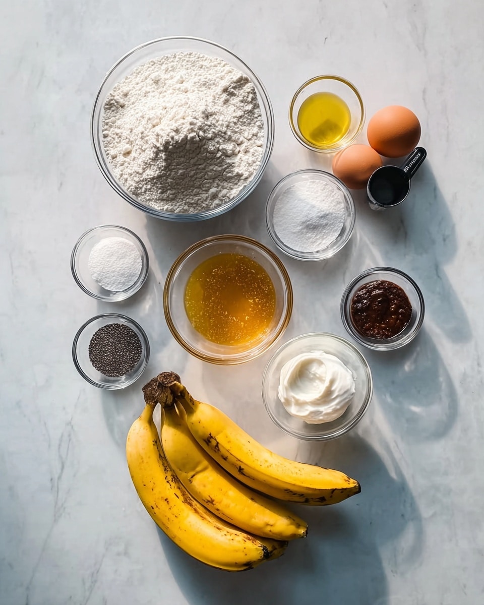 The image shows nine small glass bowls arranged neatly on a white marbled surface, each containing different baking ingredients. At the top left, there is a large clear bowl filled with white flour. Just right of it are two whole brown eggs in a small glass bowl. Below the flour, a bigger glass bowl holds golden honey with a bit of foam on top. Next to it on the right is a small black measuring cup with light yellow oil. Beneath those bowls, there are four small bowls arranged in a square: the top left one has tiny black chia seeds, the top right has white powder, likely baking soda or powder, the bottom left bowl contains thick white yogurt or sour cream, and the bottom right has a dark brown, thick paste, maybe coffee or molasses. At the bottom right of the setup, three ripe yellow bananas with some brown spots rest directly on the white marbled surface. The light is bright and natural, enhancing the colors and textures of the ingredients. photo taken with an iphone --ar 4:5 --v 7