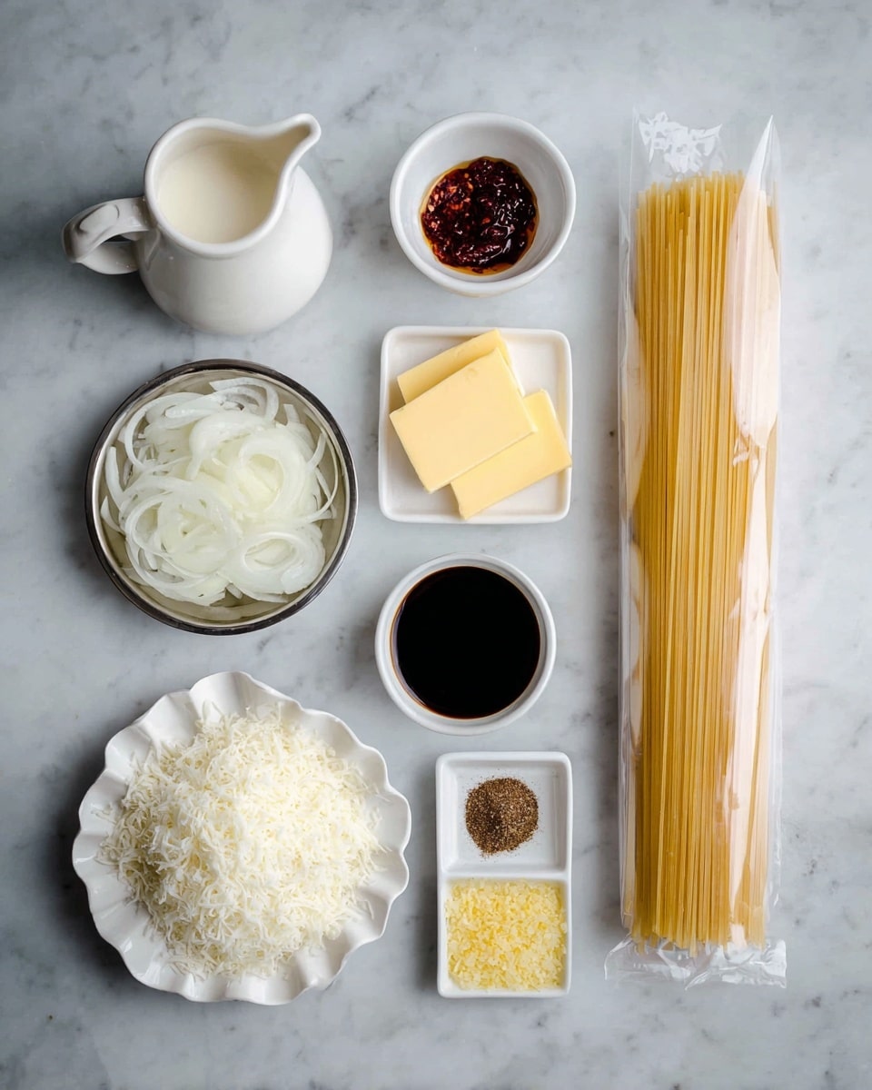 a top down, flat lay view of culinary ingredients arranged on a light grey, marbled surface. in the center is a long, clear plastic package of dry spaghetti noodles. above it, from left to right, are a small white ceramic pitcher filled with cream, a small white ramekin with dark chili crisp oil, four sliced pads of yellow butter resting on its wrapper, and a stainless steel bowl piled with thinly sliced white onions. below the spaghetti, from left to right, are a white, scalloped edge plate mounded with finely shredded white cheese, a small square white dish divided with four spices, a small white ramekin filled with dark soy sauce, and a small square white dish filled with minced yellow garlic.photo taken with an iphone --ar 4:5 --v 7