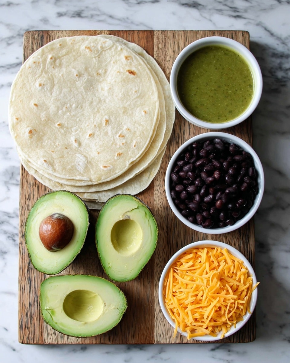 A wooden board on a white marbled texture background holds a stack of light beige soft tortillas on the left side. Next to the tortillas are two halves of a fresh avocado, one with the brown pit and the other without, showing the green creamy inside. Below the avocado, there is a small white bowl filled with green sauce. To the top right of the avocado, there is a small white bowl filled with black beans, and below it, another small white bowl filled with orange shredded cheese. Photo taken with an iphone --ar 4:5 --v 7