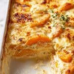 Butternut Squash Casserole with Garlic, Herb Infused Cream, and Cheddar Recipe