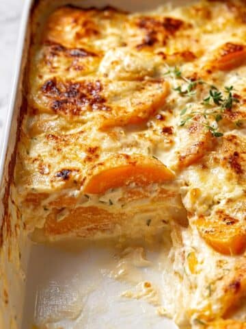 Butternut Squash Casserole with Garlic, Herb Infused Cream, and Cheddar Recipe